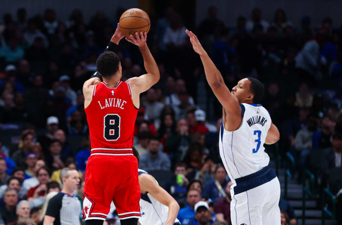 Chicago Bulls star Zach LaVine shoots over Dallas Mavericks' Grant Williams.